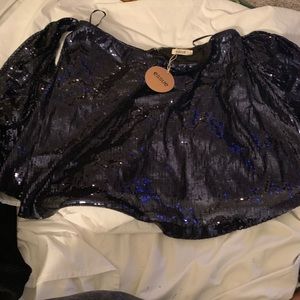 Sparkly off the shoulder top.